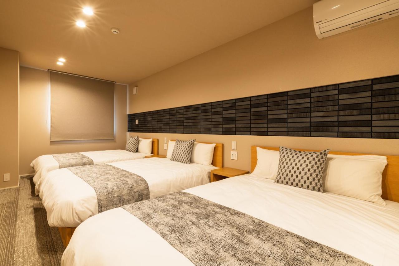 Grand Base Urakami Aparthotel Nagasaki Bagian luar foto