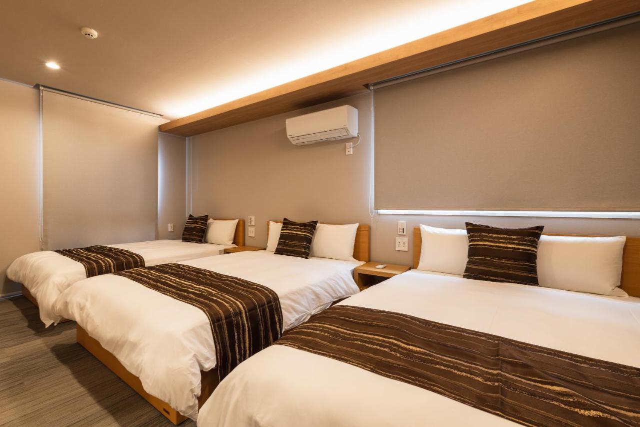 Grand Base Urakami Aparthotel Nagasaki Bagian luar foto